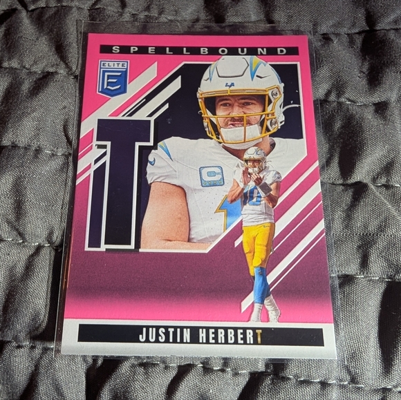 2025 Panini Donruss Elite - Spellbound Justin Herbert #40 Pink Parallel "T" - Picture 1 of 2
